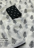 Crush white and black embroidery saree.
