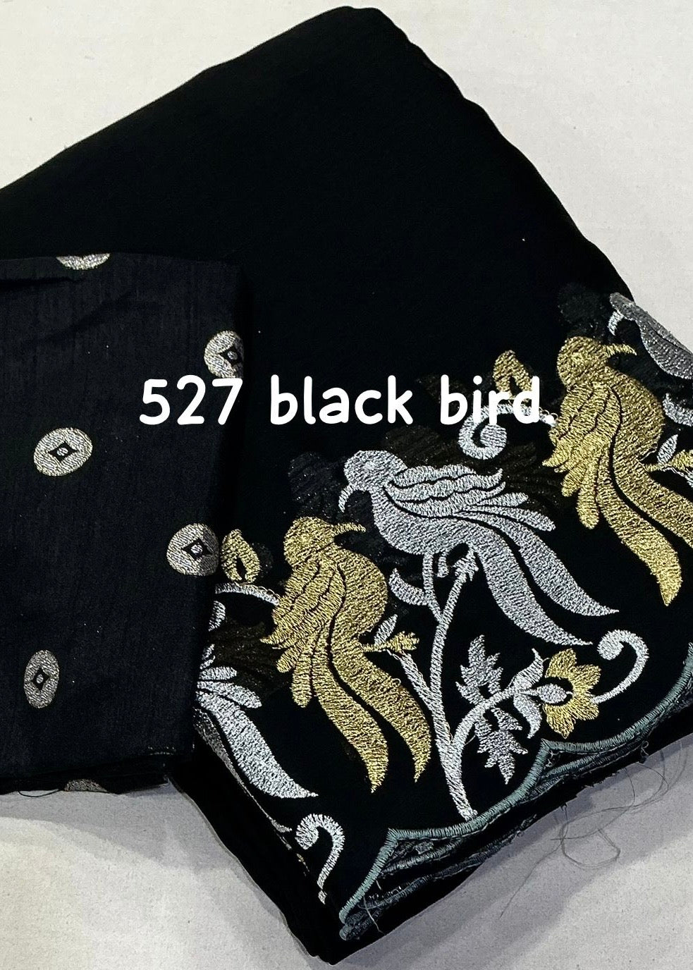 Black chiffon satin saree.