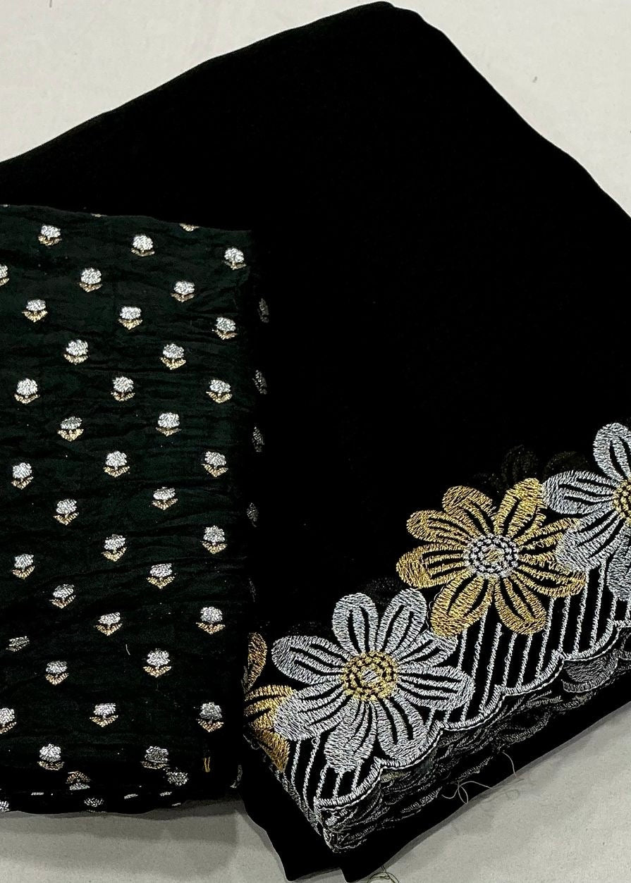 Black satin chiffon saree.