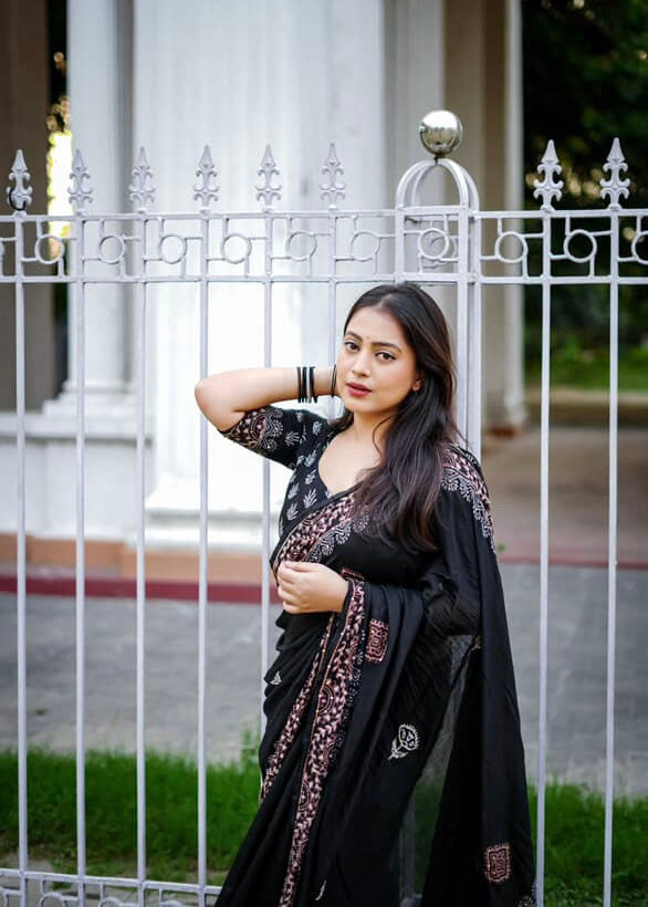 Black ajrakh handwork saree.