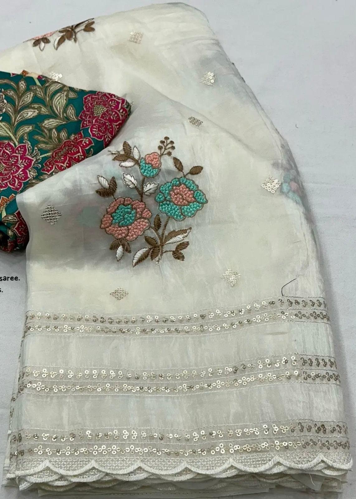 Paper crush white embroidery saree.
