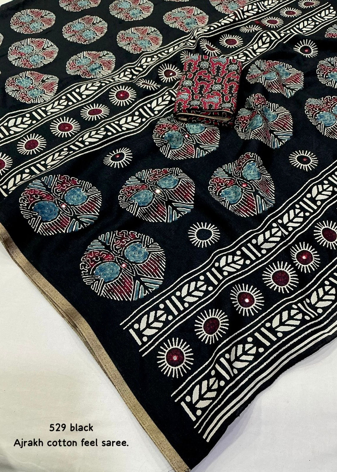 Black poly ajrakh cotton saree.