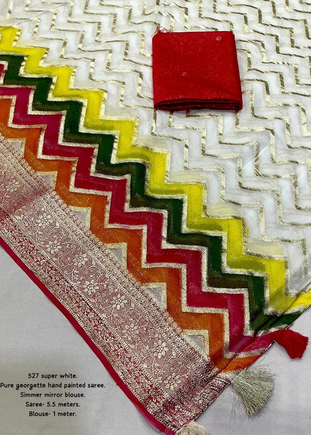 Pure georgette hand painted saree.
