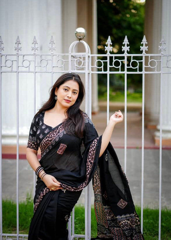 Black ajrakh handwork saree.
