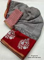 Grey/red ajrakh style saree.