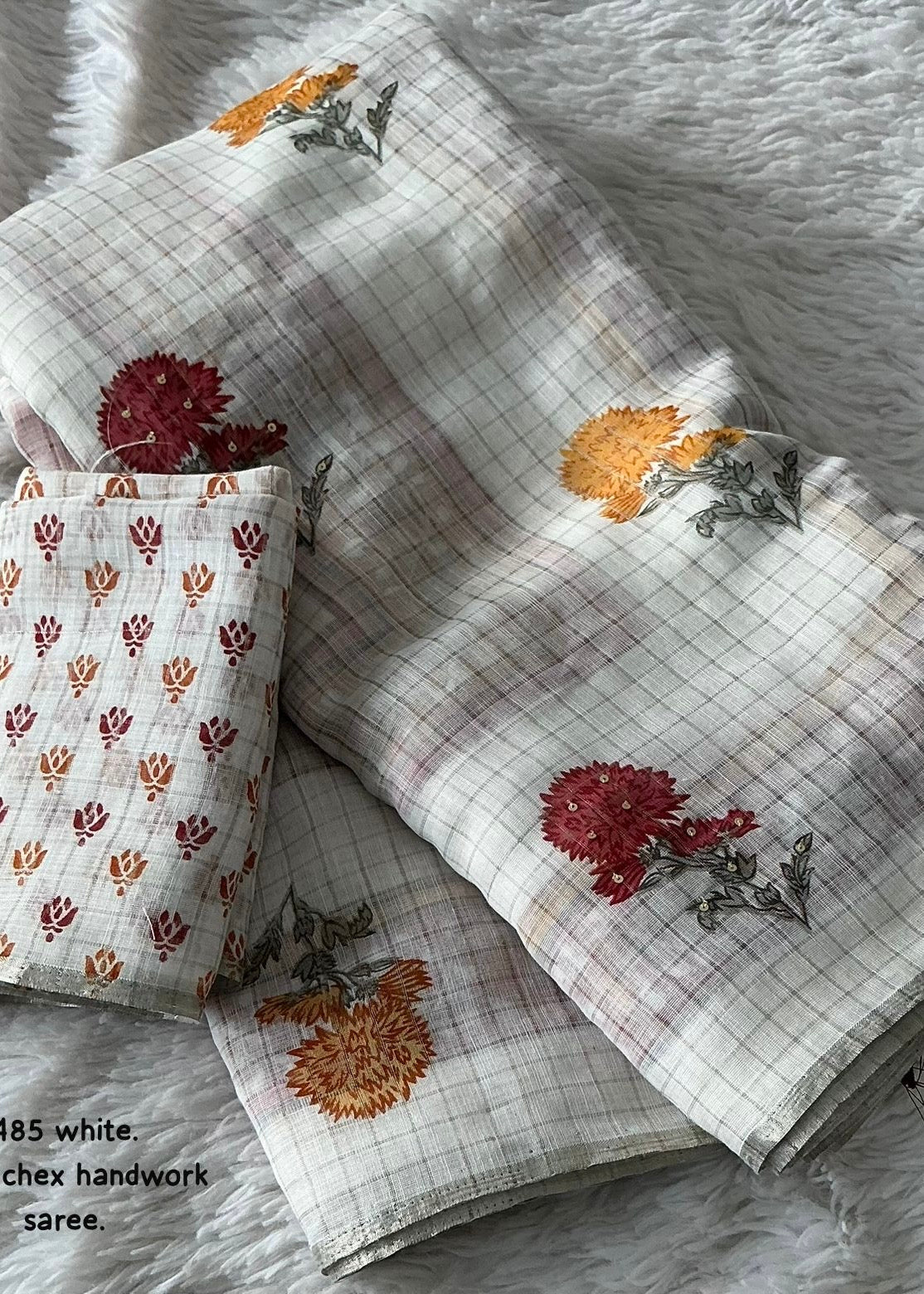 Linen chex floral saree.