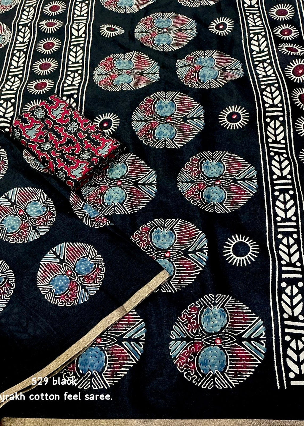 Black poly ajrakh cotton saree.