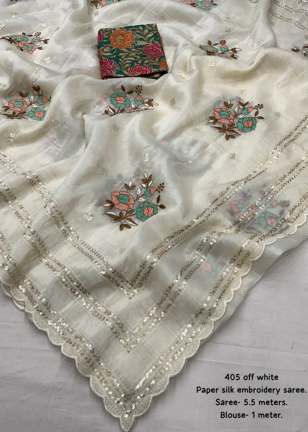Paper crush white embroidery saree.