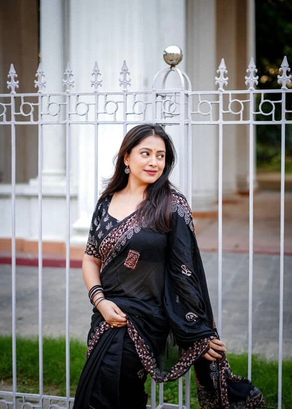 Black ajrakh handwork saree.