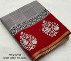 Grey/red ajrakh style saree.