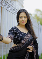Black ajrakh handwork saree.