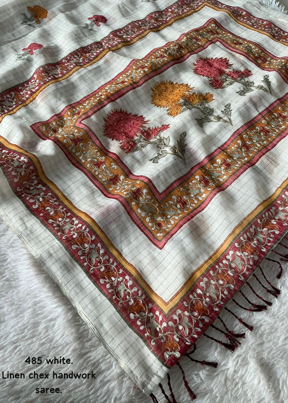 Linen chex floral saree.