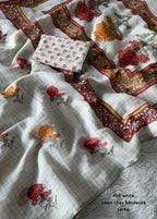 Linen chex floral saree.