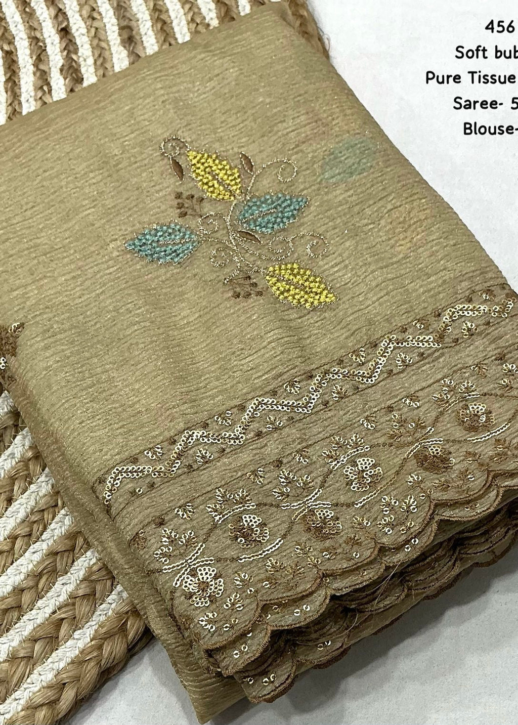 Beige crush embroidery saree.