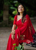 Black red embroidery saree.