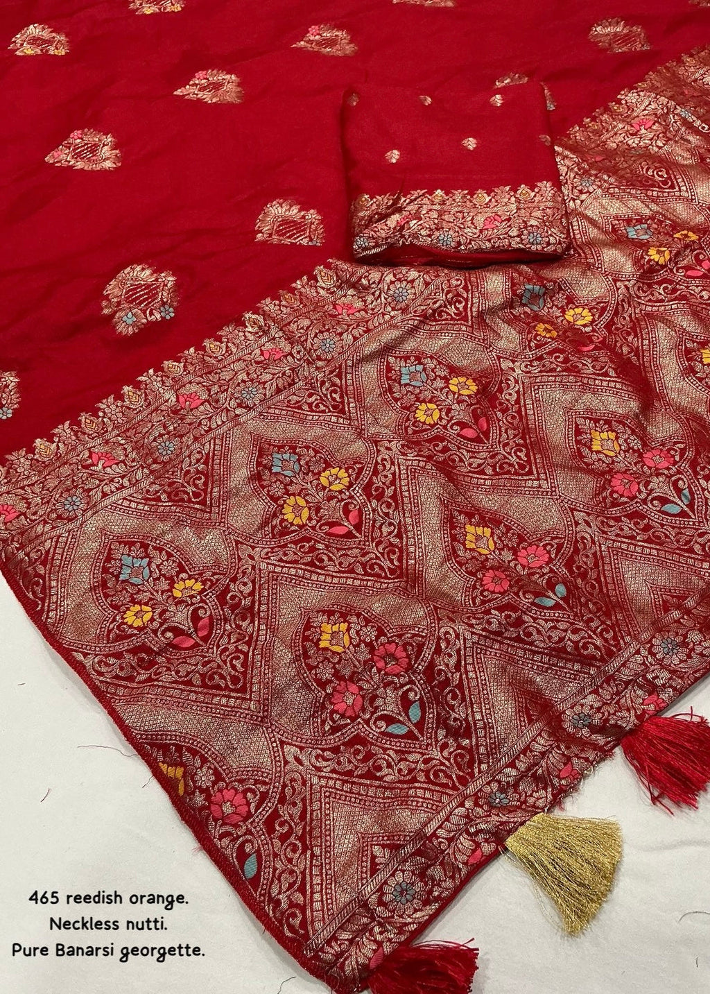 Sindoor red pure georgette crape saree.