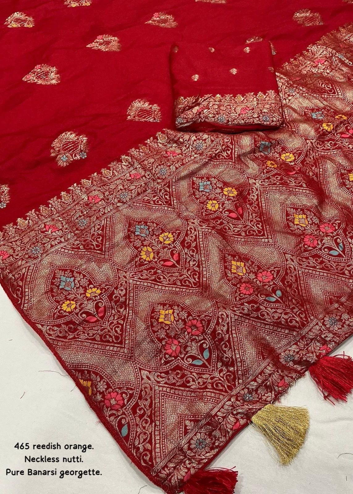 Sindoor red pure georgette crape saree.