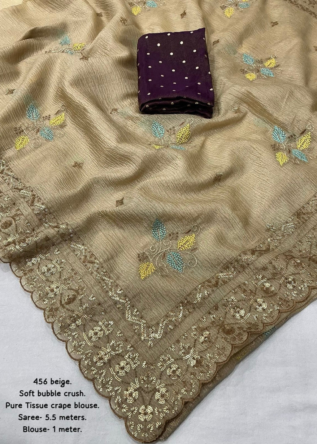 Beige crush embroidery saree.