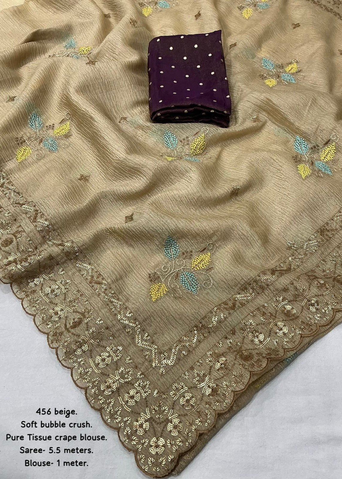 Beige crush embroidery saree.