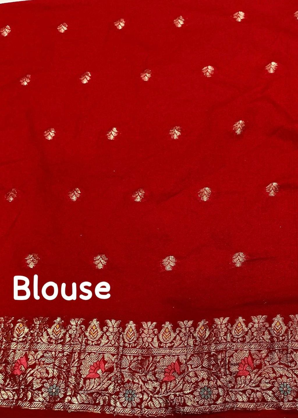 Sindoor red pure georgette crape saree.