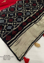 Black red embroidery saree.