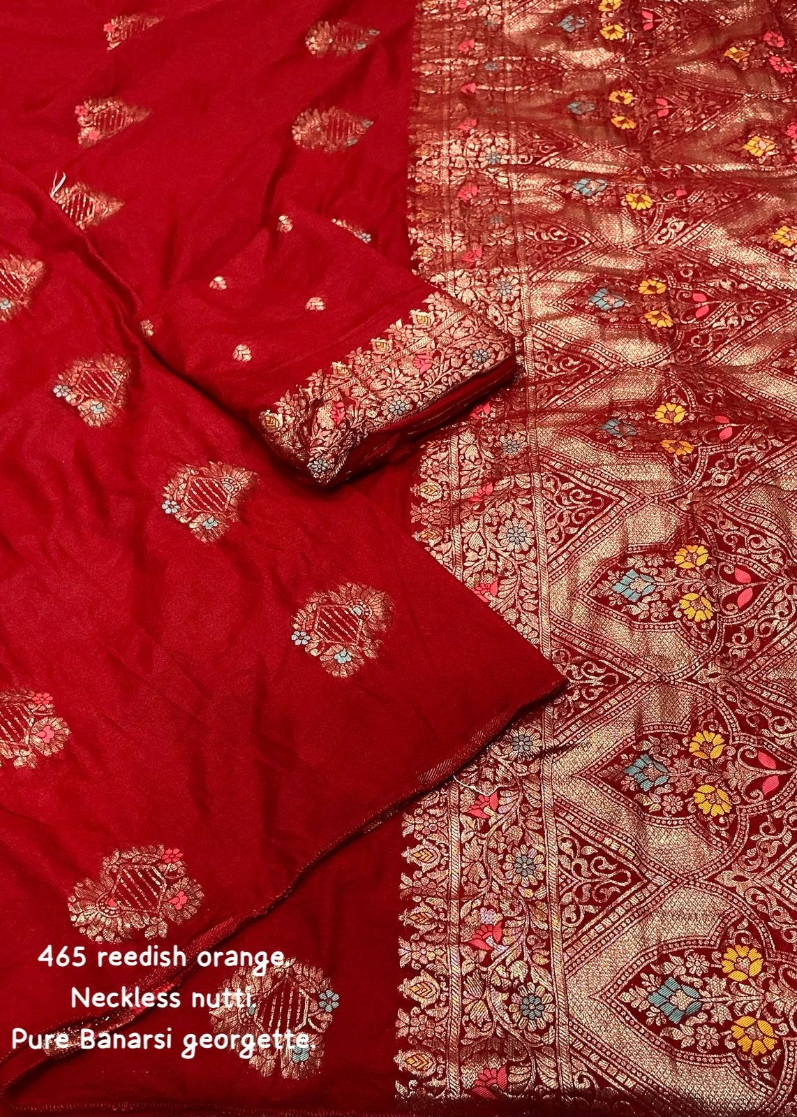 Sindoor red pure georgette crape saree.