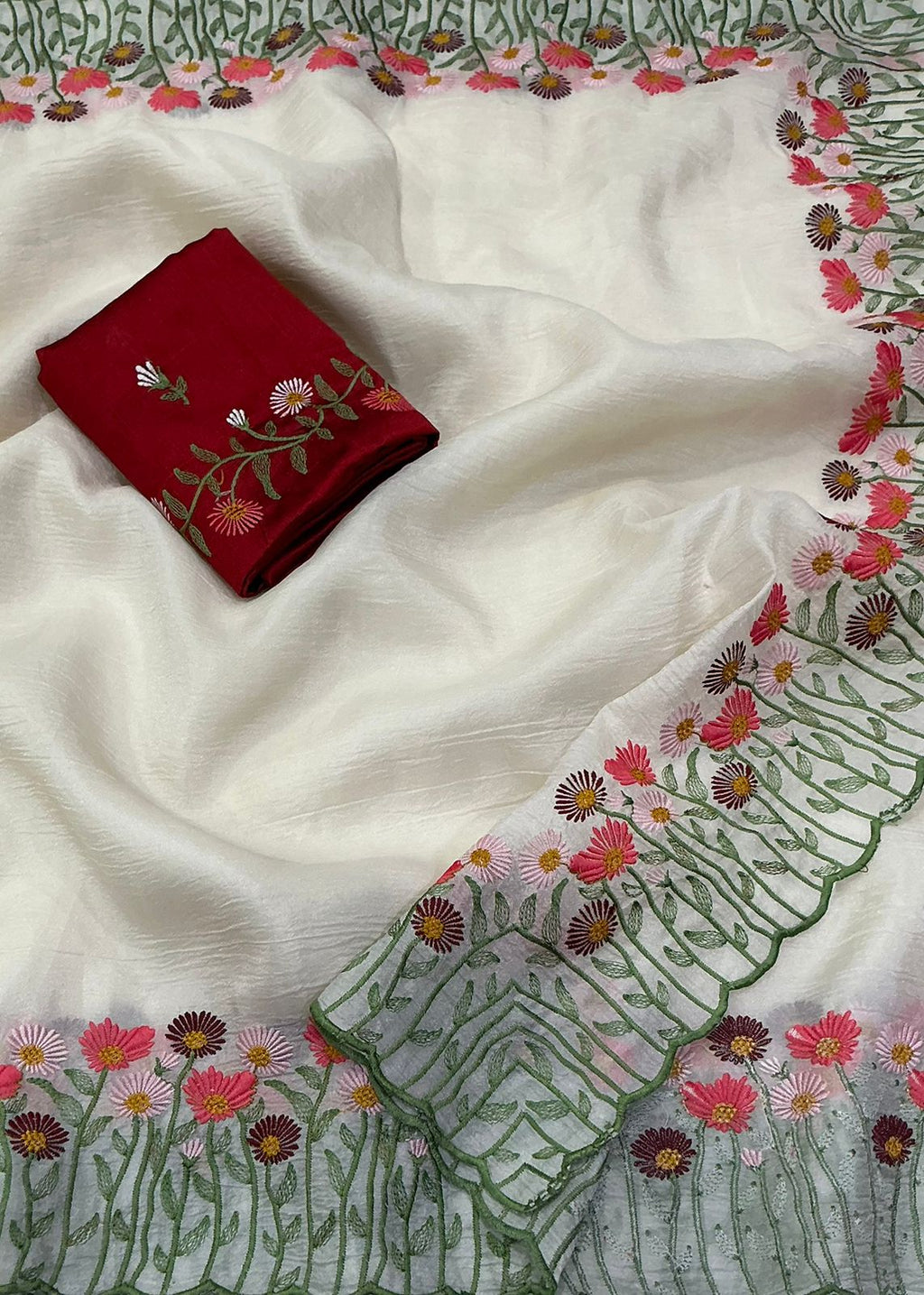 Off white crush emboridery saree.