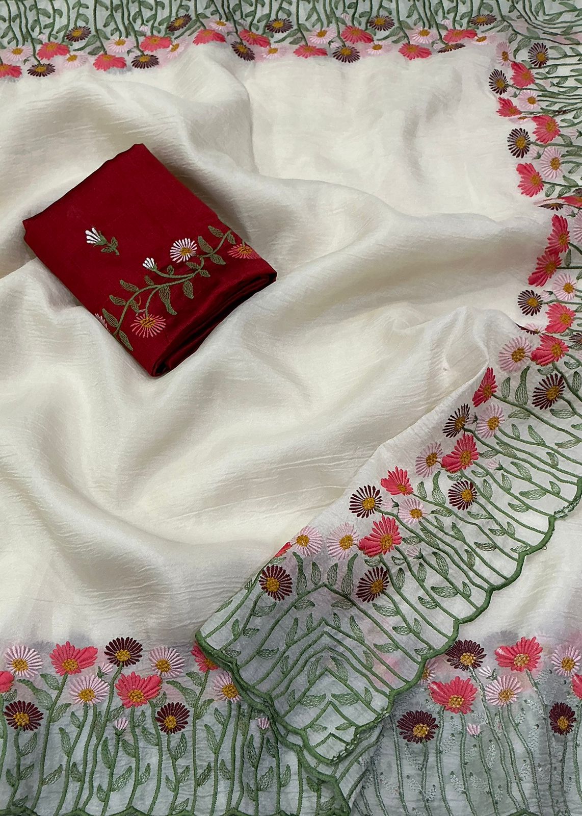 Off white crush emboridery saree.